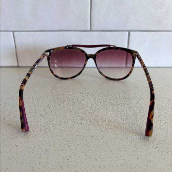 EMPORIO ARMANI EA4039 sunglasses in the colorway 5265/1 burgundy main image 4